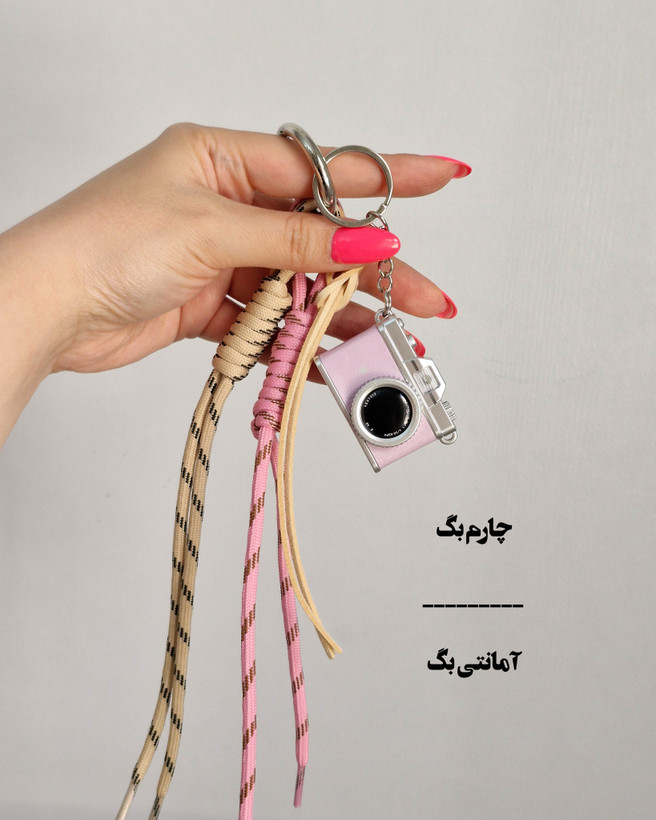 چارم بگ آویز کیف دوربین صورتی